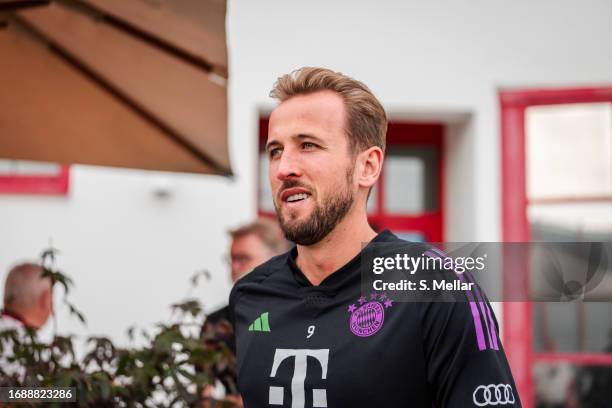 Harry Kane of FC Bayern Muenchen is smiling during Training on September 18, 2023 in Munich, Germany.