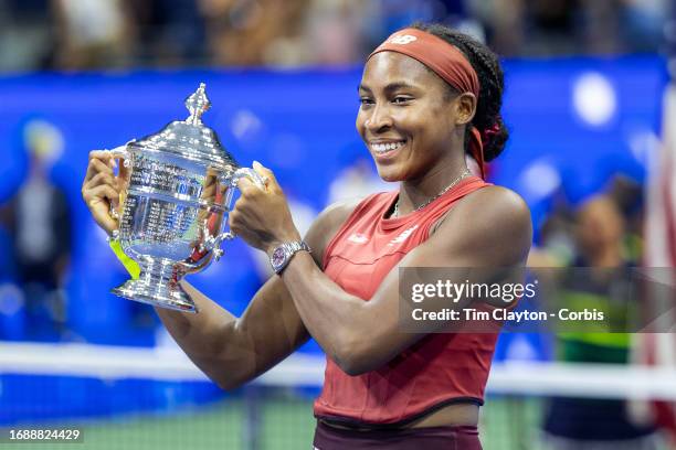 September 9: Coco Gauff of the United States with the winner's trophy after her victory against Aryna Sabalenka of Belarus in the Women's Singles...