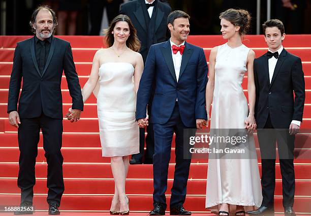 Actors Frederic Pierrot, Geraldine Pailhas, director Francois Ozon, Marine Vacth and Fantin Ravat attend the 'Jeune & Jolie' premiere during The 66th...