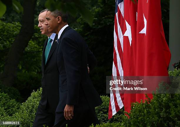 President Barack Obama and Prime Minister Recep Tayyip Erdogan of Turkey walk into the Rose Garden to speak to the media at the White House, May 16,...