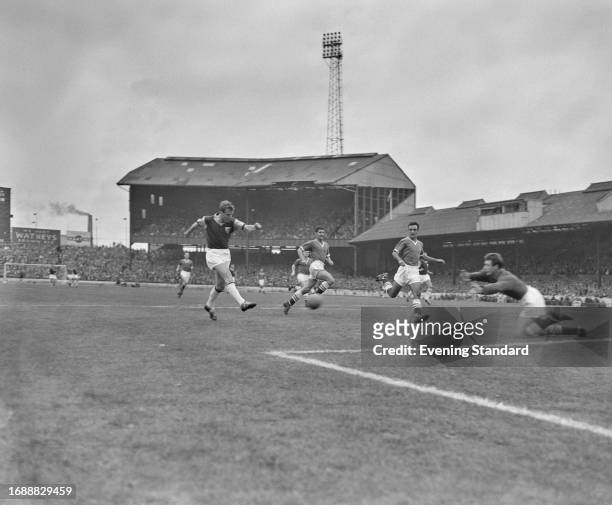 West Ham's centre forward John Dick attempting a shot on goal during a match at Stamford Bridge stadium in London, September 19th 1959. Chelsea...