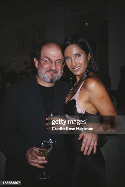 British Indian novelist Salman Rushdie with his partner, actress and author Padma Lakshmi at a Talk Magazine party for Martin Amis in New York City,...
