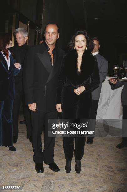 American fashion designer and film director Tom Ford with Bianca Jagger at the CFDA Awards, USA, circa 2000.