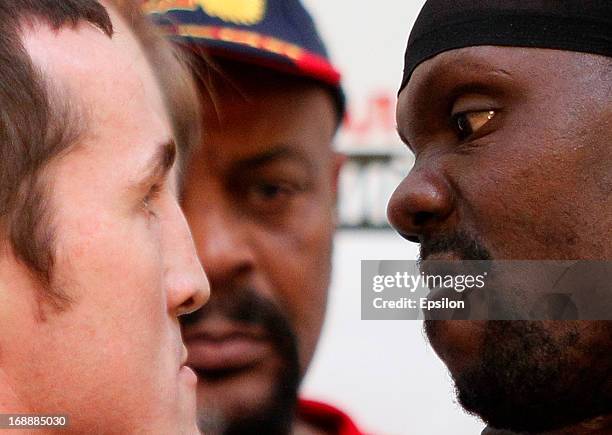 Denis Lebedev of Russia and Guillermo Jones of Panama face off during the official weigh-in for their WBA cruiserweight title bout at the...