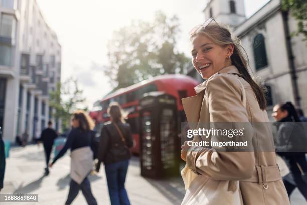 teenage girl walking in london, united kingdom - dental aligners stock pictures, royalty-free photos & images