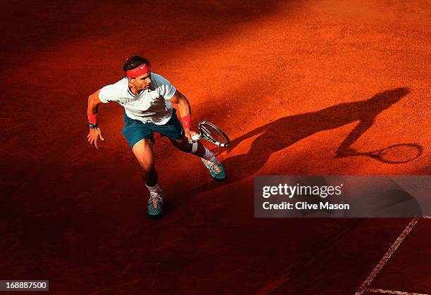 Rafael Nadal of Spain in action during his third round match against Ernests Gulbis of Latvia on day five of the Internazionali BNL d'Italia 2013 at...