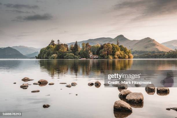 sunset at derwentwater, lake district, england uk - calm water stock pictures, royalty-free photos & images