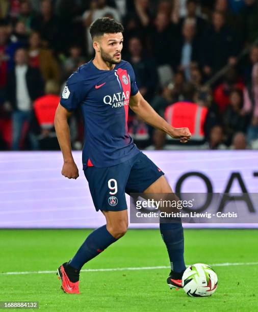 Gonçalo Ramos of Paris Saint-Germain runs with the ball during the Ligue 1 Uber Eats match between Paris Saint-Germain and Olympique de Marseille at...