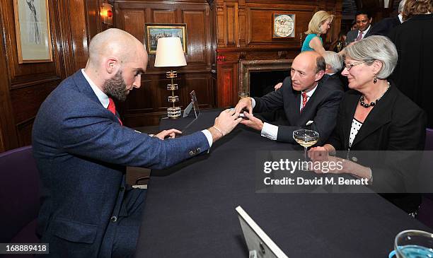 Drummond Money-Coutts entertains guests at the 175th Anniversary party of Brown's Hotel at Rocco Forte's Brown’s Hotel on May 16, 2013 in London,...