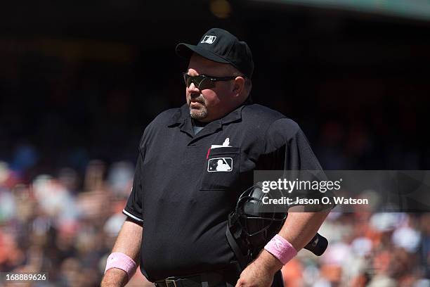 Umpire Wally Bell stands behind home plate during the sixth inning between the San Francisco Giants and the Atlanta Braves at AT&T Park on May 12,...