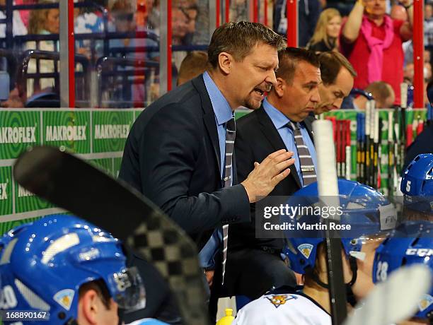 Jukka Jalonen, head coach of Finland gives instructions during the IIHF World Championship quarterfinal match between Finland and Slovakia at...