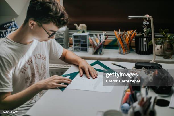 male doing technical drawing - set square stock pictures, royalty-free photos & images
