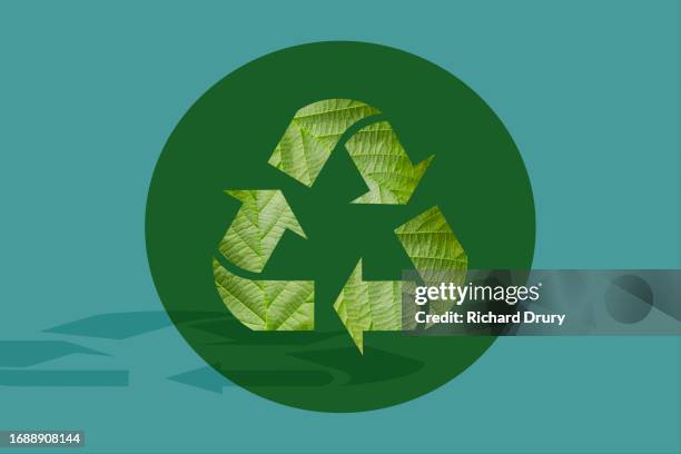 a recycling symbol made of leaves - economy icon stock pictures, royalty-free photos & images