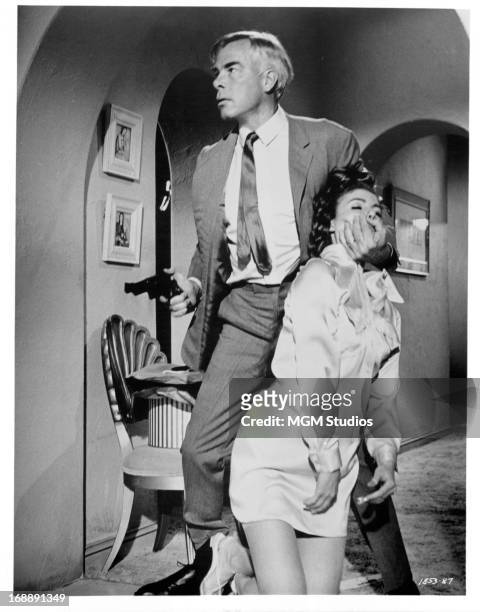 Lee Marvin restrains his wife, Sharon Acker in a scene from the film 'Point Blank', 1967.