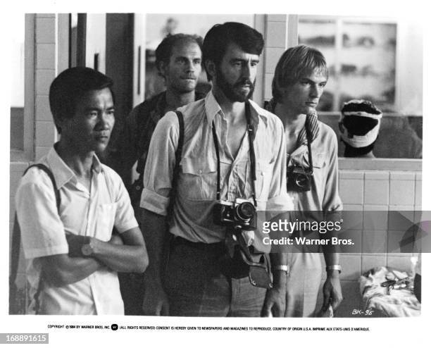 Haing S Ngor, John Malkovich, Sam Waterston and Julian Sands in a scene from the film 'The Killing Fields', 1984.