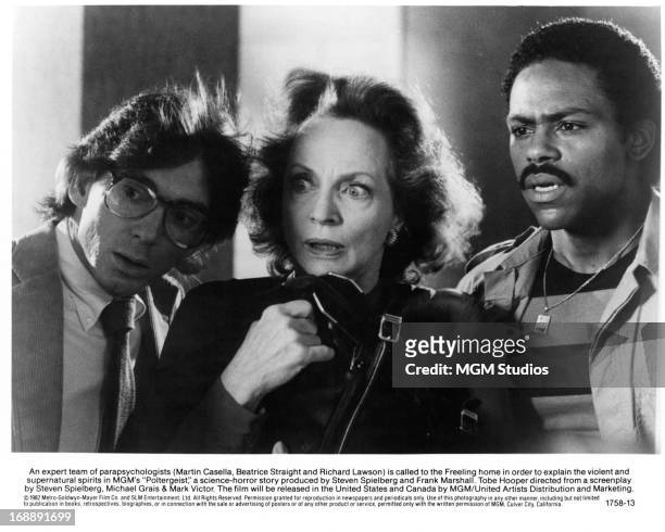 Martin Casella, Beatrice Straight and Richard Lawson are confronted with spirits in a scene from the film 'Poltergeist', 1982.