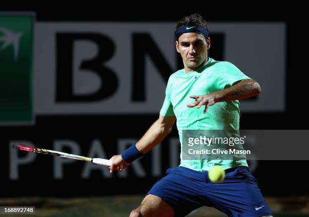 Roger Federer of Switzerland in action during his third round match against Gilles Simon of France on day five of the Internazionali BNL d'Italia...