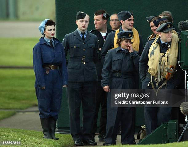 Personnell in period costume take part in a Sunset Ceremony to mark the 70th anniversary of the World War II Dambusters mission at RAF Sccampton on...