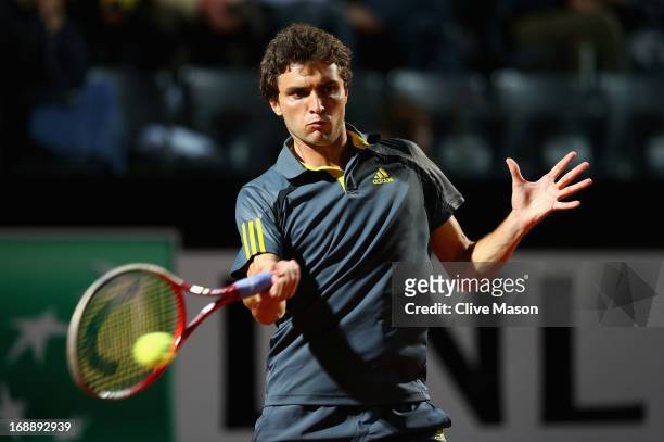 Gilles Simon of France in action during his third round match against Roger Federer of Switzerland on day five of the Internazionali BNL d'Italia...