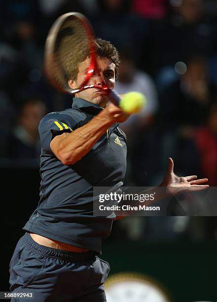 Gilles Simon of France in action during his third round match against Roger Federer of Switzerland on day five of the Internazionali BNL d'Italia...