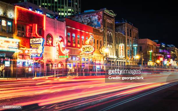 nashville's lower broadway - long exposure restaurant stock pictures, royalty-free photos & images