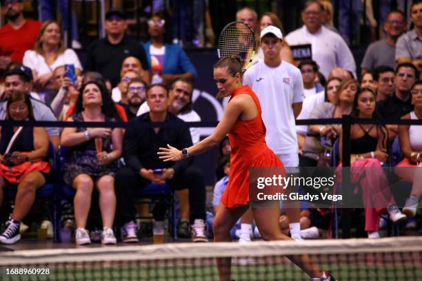 Mónica Puig serves the ball during her Exhibition Match with Venus Williams at Coliseo de Puerto Rico José Miguel Agrelot on September 15, 2023 in...