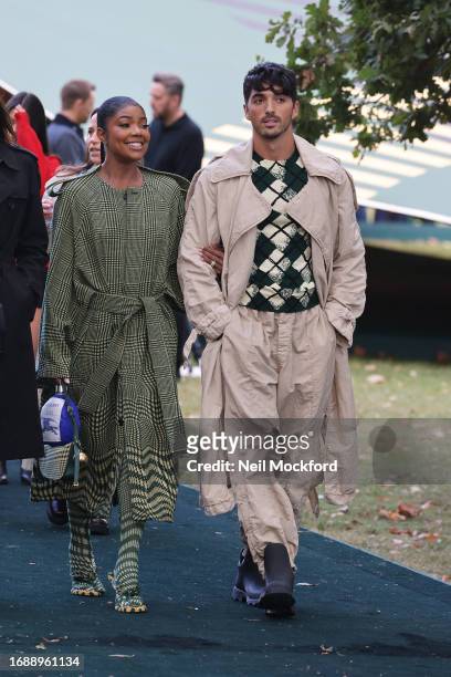 Gabrielle Union and Taylor Zakhar Perez attend Burberry s/s24 Collection catwalk show at Highbury Fields during London Fashion Week September 2023 on...
