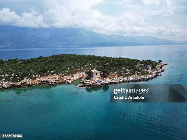 An aerial view of the Orata Island which is being restored under the support of the Turkish Ministry of Culture and Tourism, Mugla Sitki Kocman...