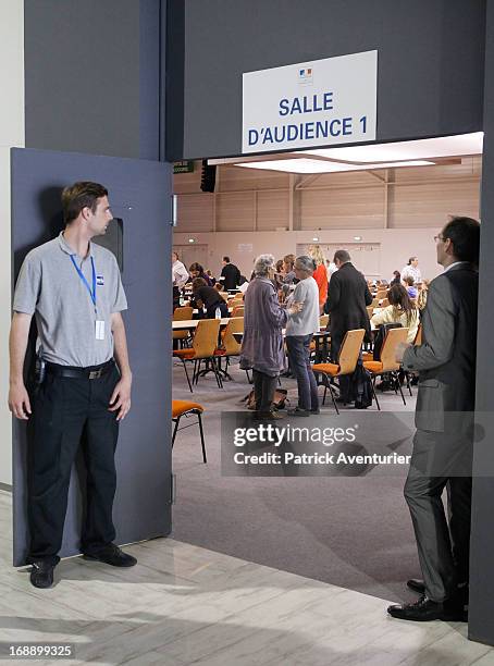 Women who received PIP breast implants wait inside the courthouse with their lawyers at Parc Chanot on May 16, 2013 in Marseille, France. Jean-Claude...