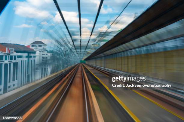 long exposure on kuala lumpur train,malaysia - monorail stock pictures, royalty-free photos & images