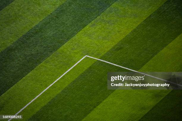 aerial view of an empty green football pitch - bola de futebol imagens e fotografias de stock