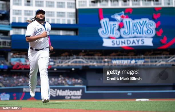 Vladimir Guerrero Jr. #27 of Toronto Blue Jays runs on the field before playing the Boston Red Sox in their MLB game at the Rogers Centre on...