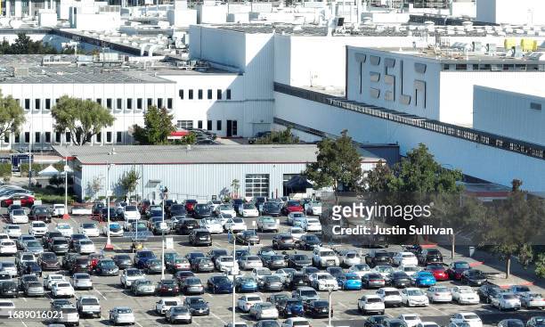 In an aerial view, the exterior of the Tesla automotive company manufacturing facility is seen on September 18, 2023 in Fremont, California. Israeli...