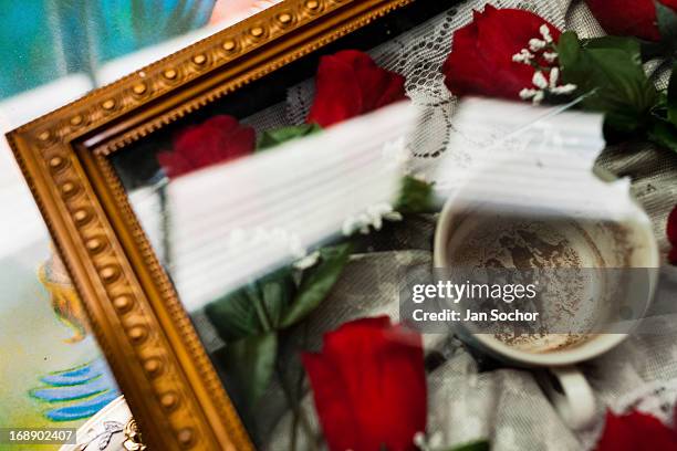 Religious relic, holding a sign recorded in coffee ground, seen at an altar of Hermes Cifuentes, a Colombian spiritual healer, in La Cumbre,...