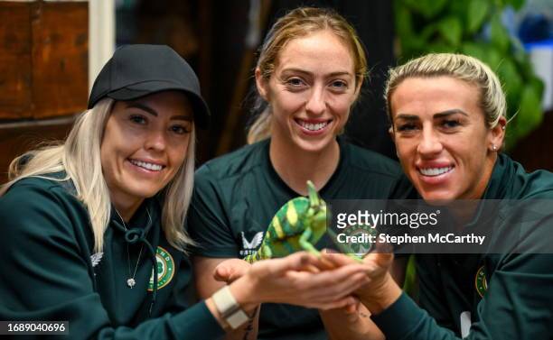 Budapest , Hungary - 25 September 2023; Republic of Ireland players, from left, Denise O'Sullivan, Megan Connolly and Savannah McCarthy with Flash, a...
