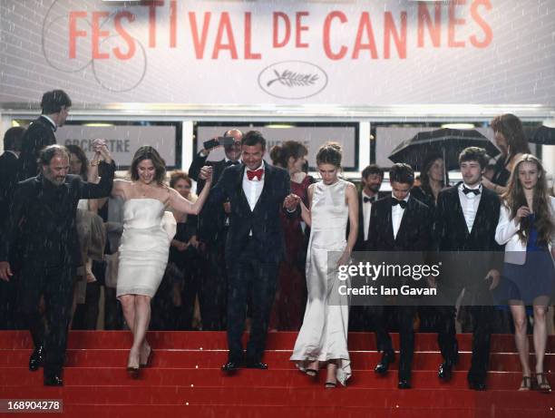 Actors Frederic Pierrot, Geraldine Pailhas, director Francois Ozon, Marine Vacth and Fantin Ravat depart the 'Jeune & Jolie' premiere during The 66th...