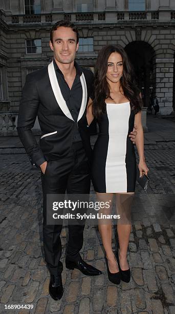 Thom Evans and Jessica Lowndes leaving Somerset House on May 16, 2013 in London, England.