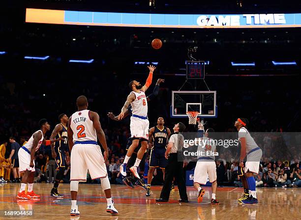 Tyson Chandler of the New York Knicks faces off against Roy Hibbert of the Indiana Pacers to start Game Five of the Eastern Conference Semifinals of...