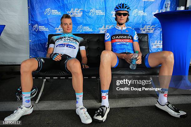 Gianni Meersman of Belgium riding for Omega Pharma-Quick Step and Johan Van Summeren of Belgium riding for Garmin-Sharp relax prior to the start of...