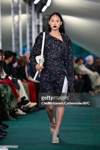Model walks the runway at the Burberry show during London Fashion Week September 2023 at on September 18, 2023 in London, England.
