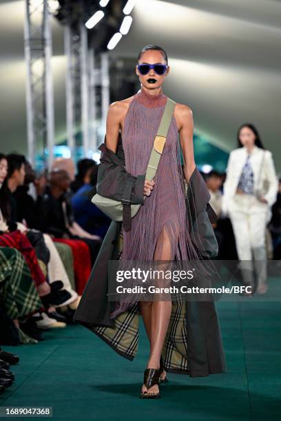 Model walks the runway at the Burberry show during London Fashion Week September 2023 at on September 18, 2023 in London, England.