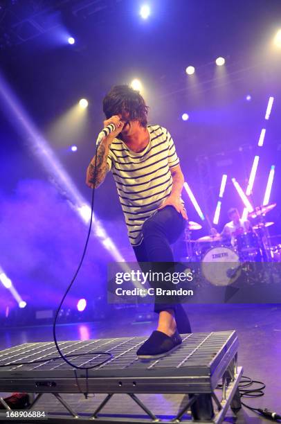 Kellin Quinn and Gabe Barham of Sleeping With Sirens perform on stage at O2 Shepherd's Bush Empire on May 16, 2013 in London, England.