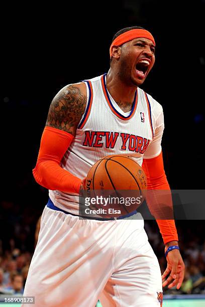 Carmelo Anthony of the New York Knicks celebrates after a basket against the Indiana Pacers during Game Five of the Eastern Conference Semifinals of...