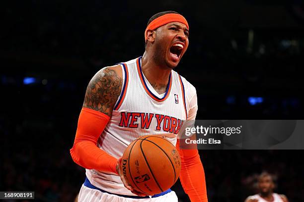 Carmelo Anthony of the New York Knicks celebrates after a basket against the Indiana Pacers during Game Five of the Eastern Conference Semifinals of...