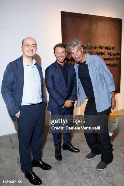 Gianfranco Maraniello, Nicolò Cardi and Maurizio Cattelan attend the Jannis Kounellis Exhibition at the Cardi Gallery on September 18, 2023 in Milan,...