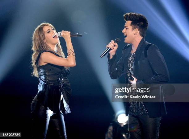 Singers Angie Miller and Adam Lambert perform onstage during Fox's "American Idol 2013" Finale Results Show at Nokia Theatre L.A. Live on May 16,...