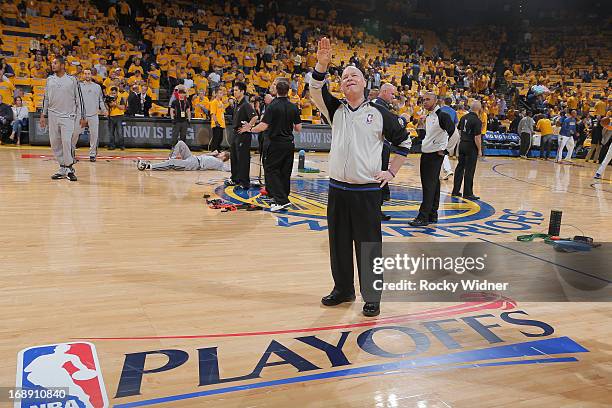 Official, Joey Crawford, waves to the crowd before Game Six of the Western Conference Semifinals between the San Antonio Spurs and the Golden State...