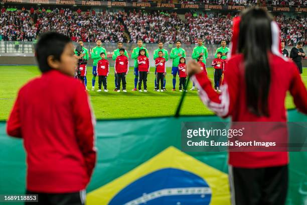 Players of Brazil sing the national anthem prior to the FIFA World Cup 2026 Qualifiers match between Peru and Brazil at Estadio Nacional de Lima on...