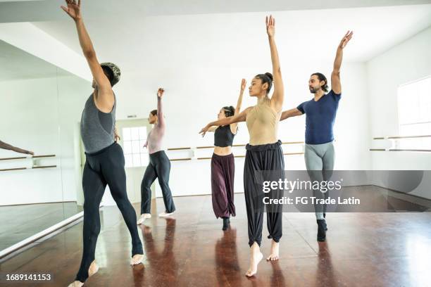 group of people dancing at dance studio - ballet studio stock pictures, royalty-free photos & images