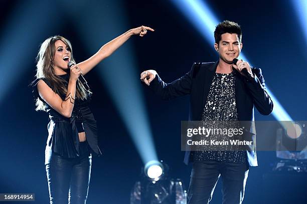 Contestant Angie Miller and singer Adam Lambert perform onstage during Fox's "American Idol 2013" Finale Results Show at Nokia Theatre L.A. Live on...